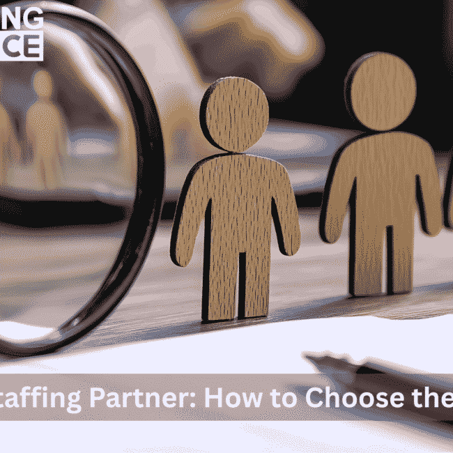 Magnifying glass highlighting a wooden figure among others — representing the process of choosing the best SAP staffing partner.